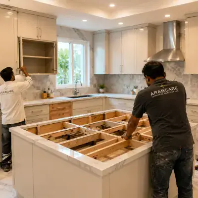 ArabCare team rebuilding a kitchen island in a Dubai home