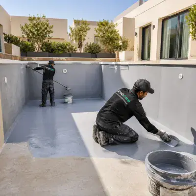 Empty pool shell being resurfaced by ArabCare in Dubai